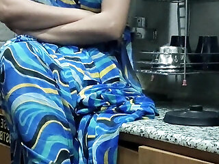 Indian Stepmom Watches And Enters Her Stepson's Kitchen To Fuck Him.
